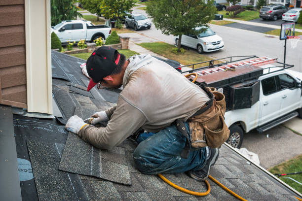 Professional Roofing technician working in West Eaton, NY